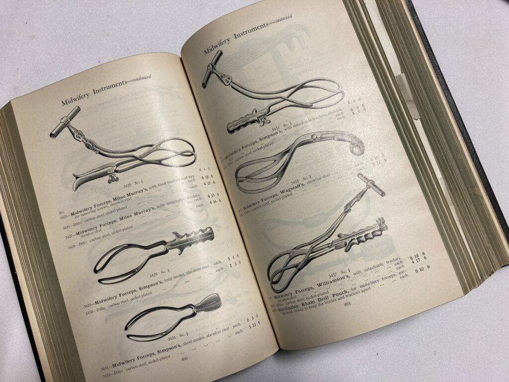 Book showing midwifery instruments